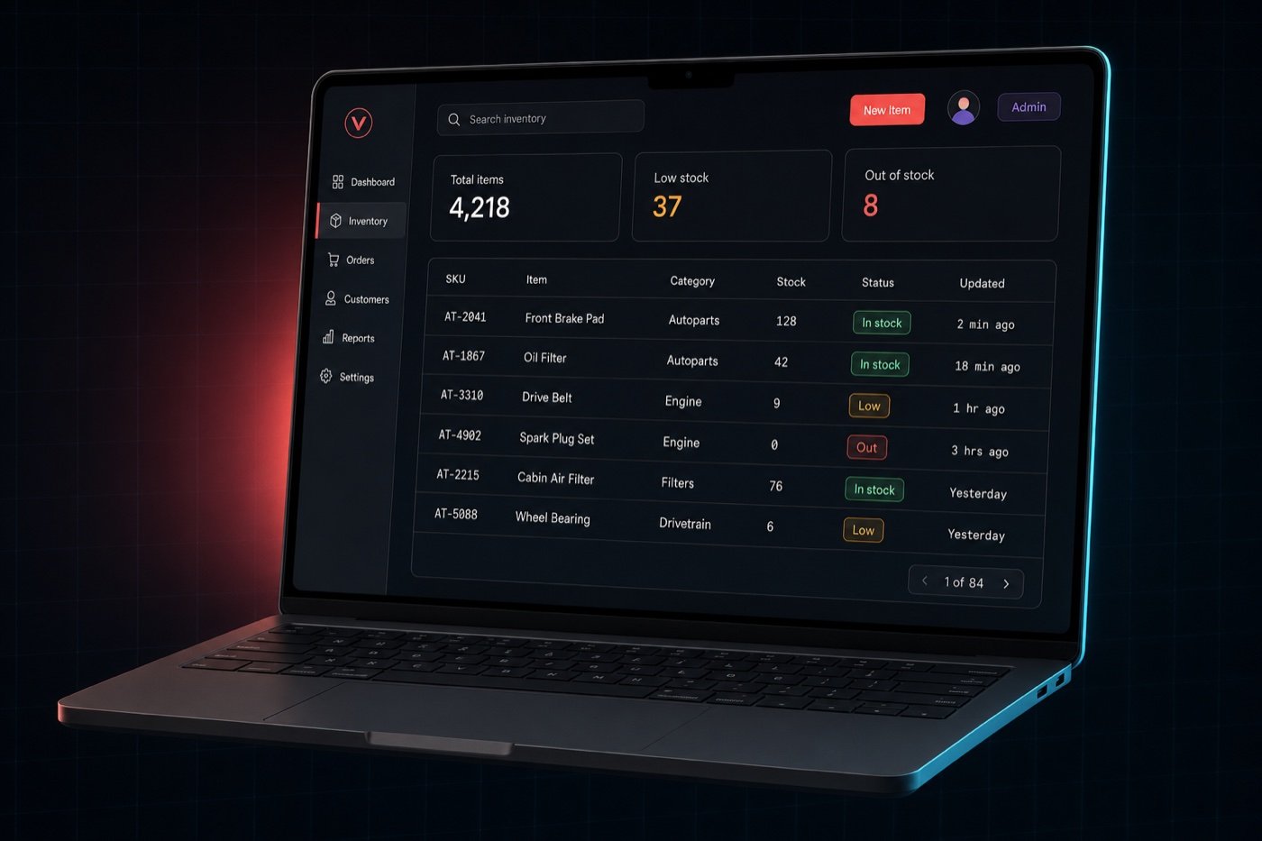 Custom admin dashboard on a laptop showing an inventory table with SKU, item, category, stock, status and last-updated columns, plus KPI tiles for total items, low stock and out-of-stock counts